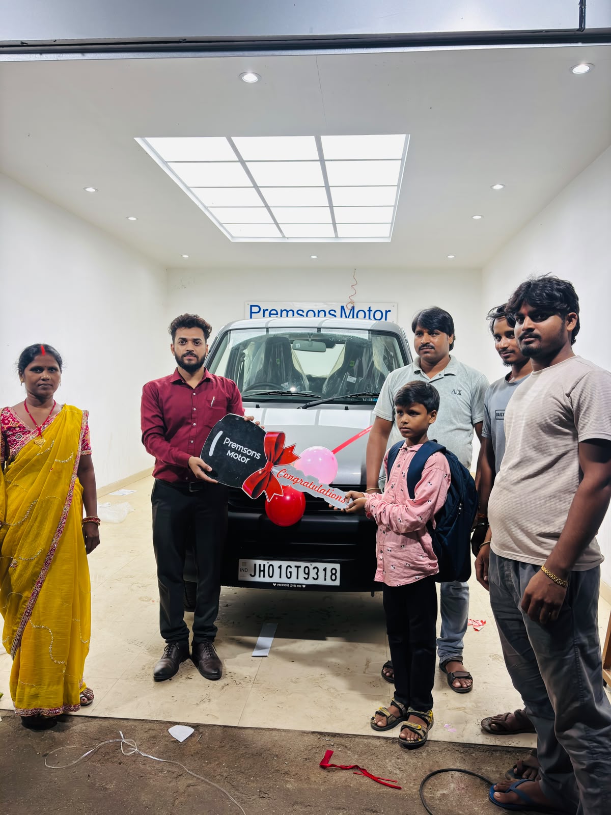 Customer with Maruti Suzuki dealership team