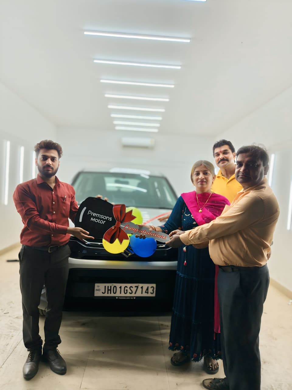 New car handover ceremony at Premsons Motor