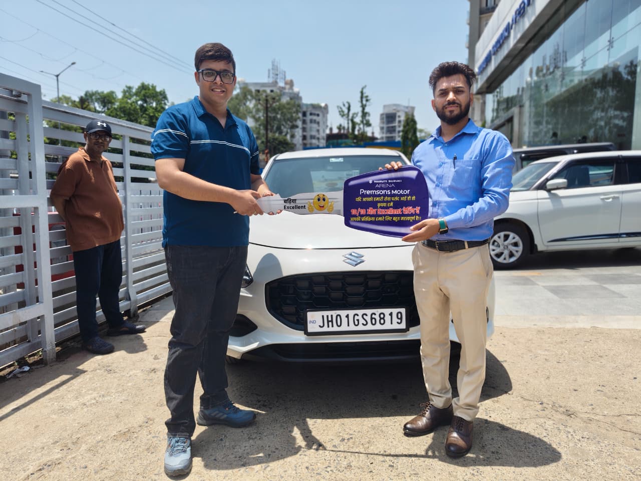 Happy customer car delivery at Maruti Suzuki showroom