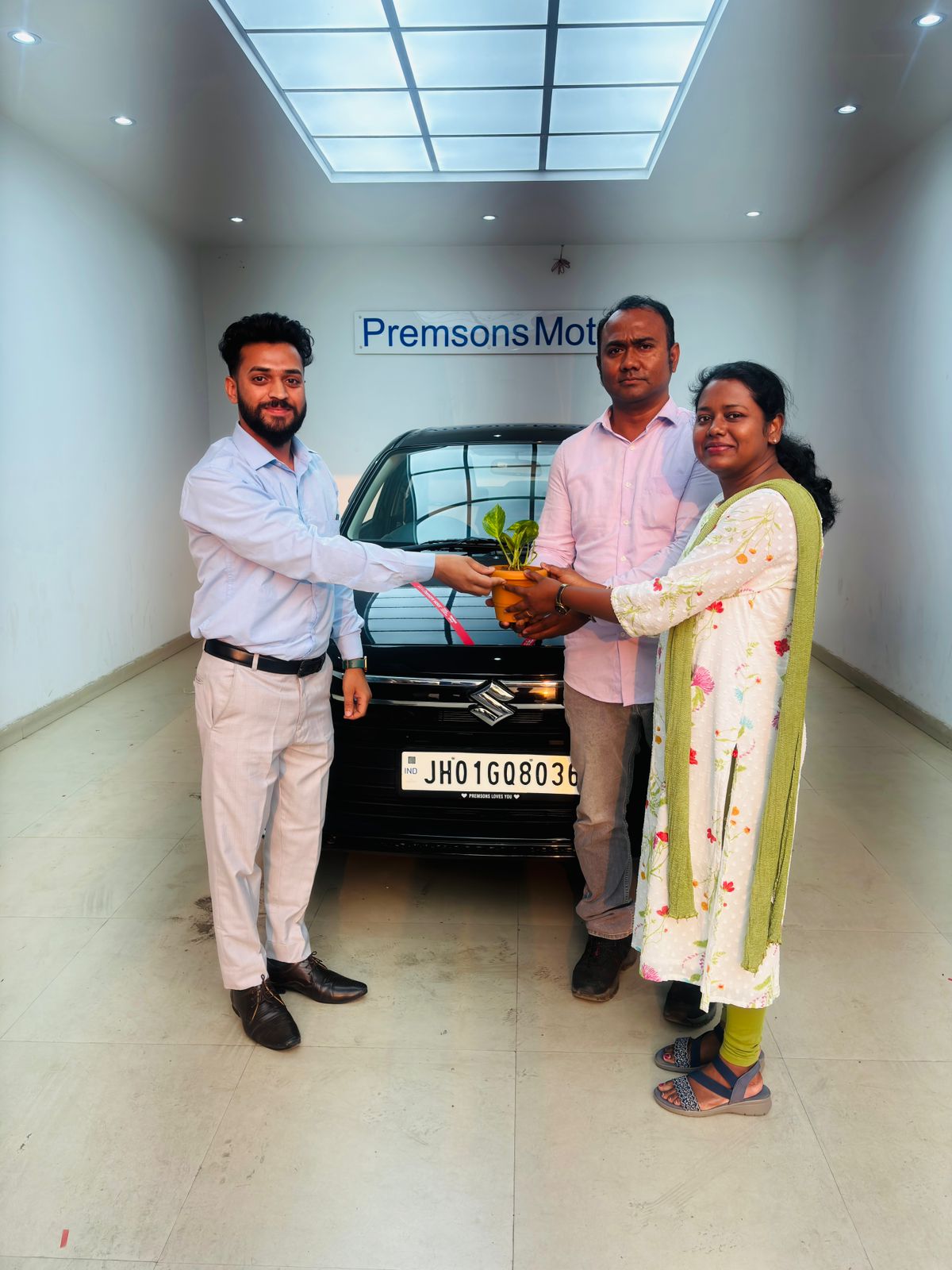 Final delivery photo with Maruti Suzuki customer